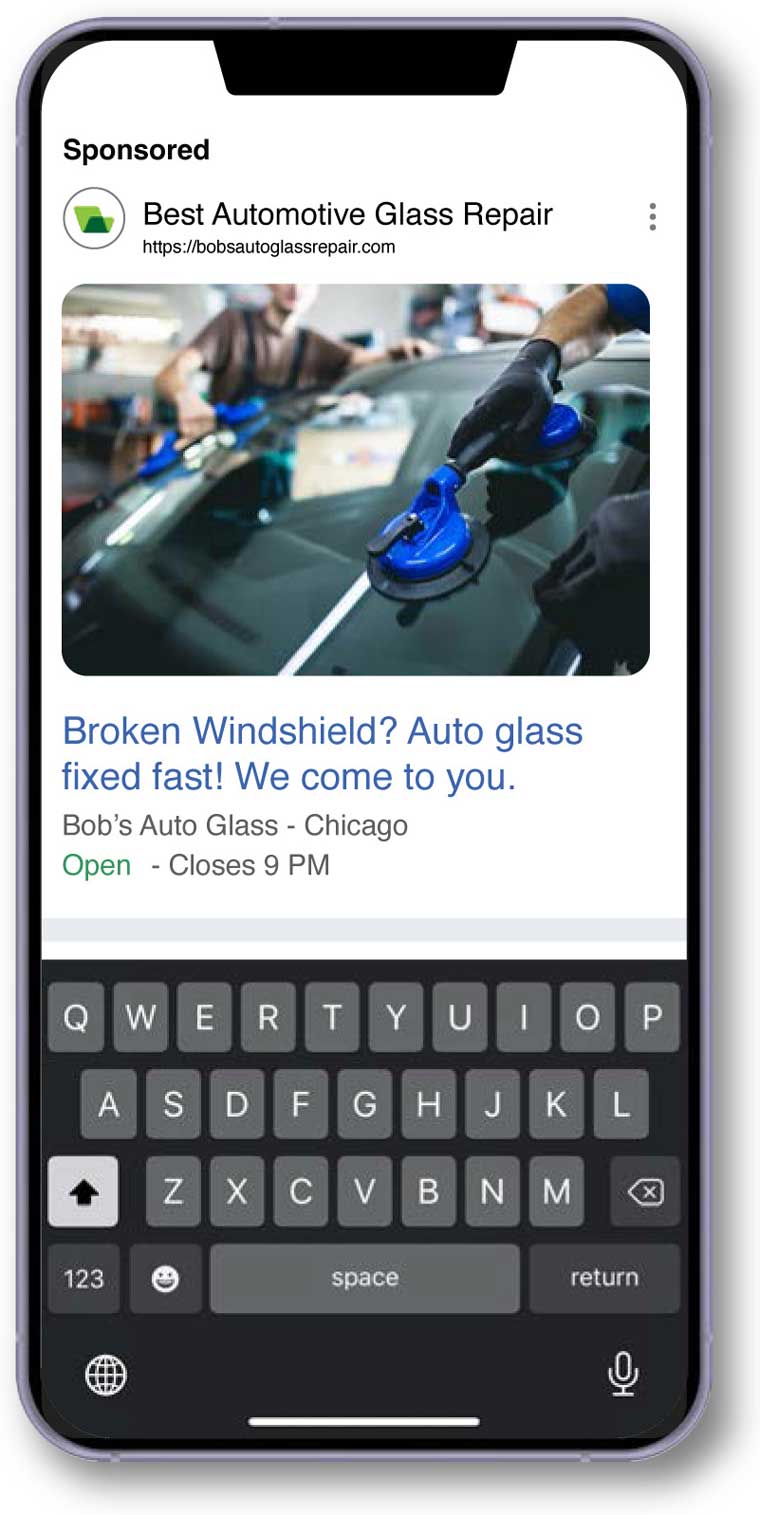 Mobile device displaying an ad for auto glass replacement services